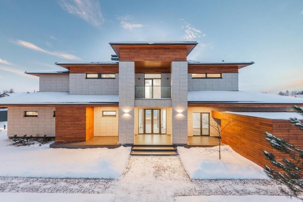 contemporary lighted house in winter